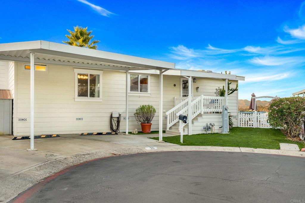 9100 Single Oak Drive, Unit 26 Lakeside, CA 92040 - Photo 32 of 46 a view of a house with a yard
