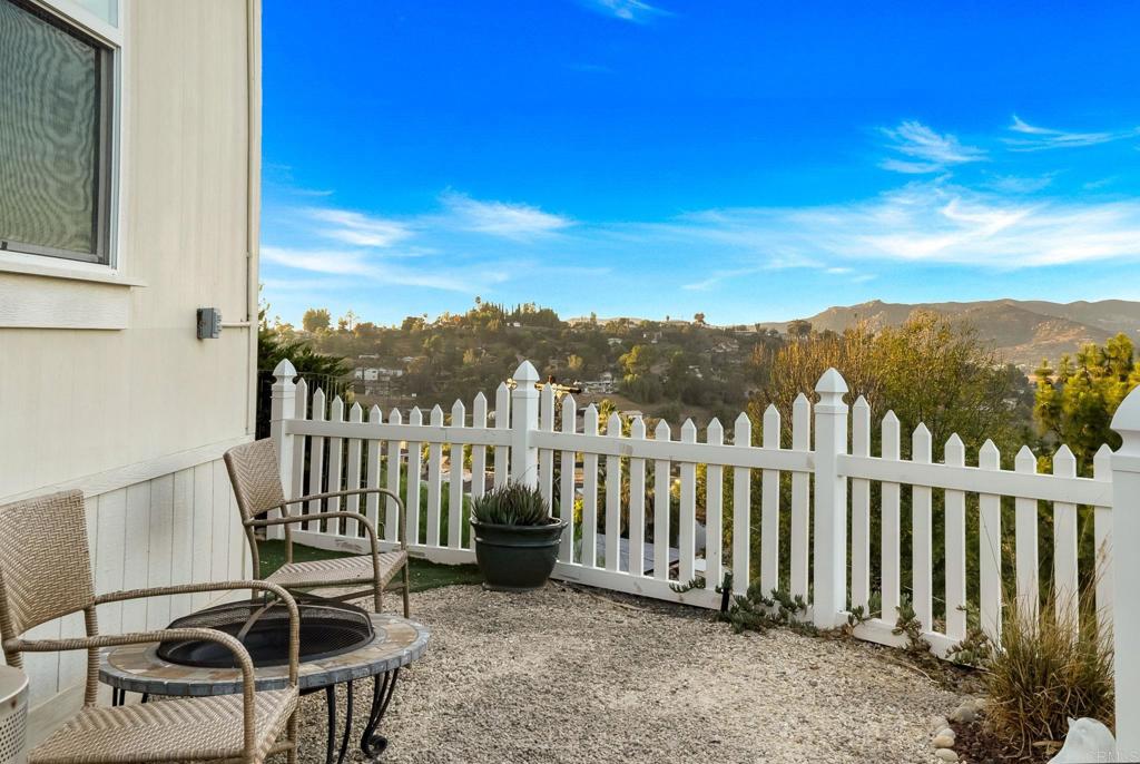 9100 Single Oak Drive, Unit 26 Lakeside, CA 92040 - Photo 34 of 46 a view of a chair and table in the balcony