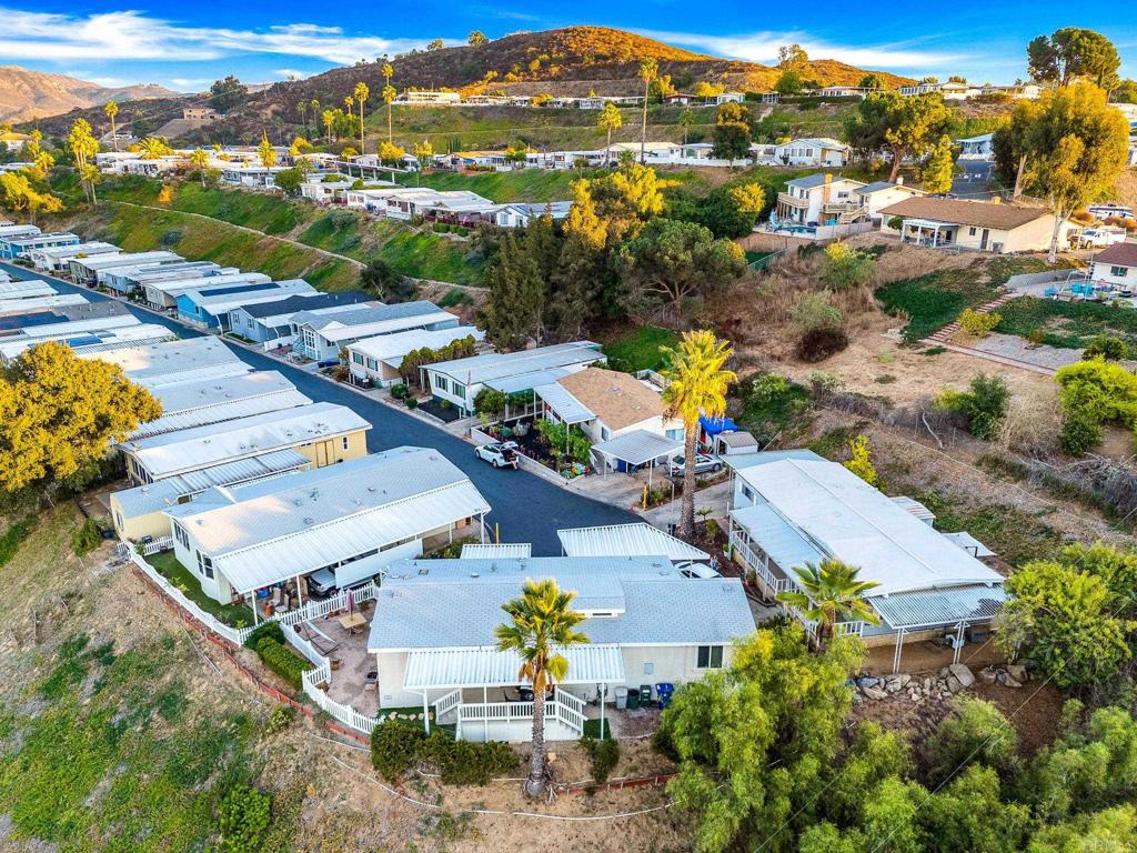 9100 Single Oak Drive, Unit 26 Lakeside, CA 92040 - Photo 42 of 46 an aerial view of residential houses with outdoor space