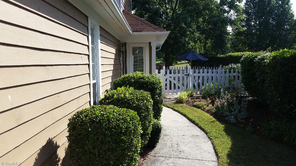 3216 Pipers Way High Point, NC 27265 - Photo 2 of 25 Beautiful landscaping leading to front door
