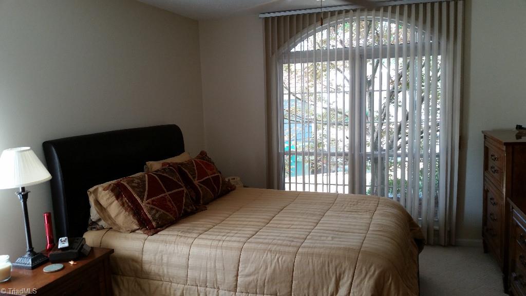 3216 Pipers Way High Point, NC 27265 - Photo 12 of 25 Master bedroom with large window to allow for natural light.