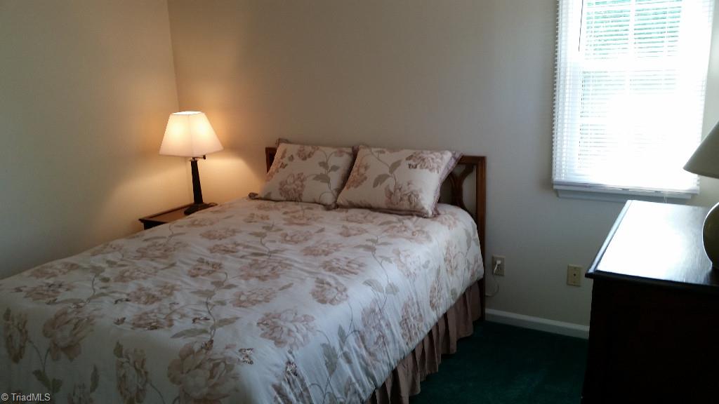 3216 Pipers Way High Point, NC 27265 - Photo 16 of 25 One of two good size bedrooms upstairs.