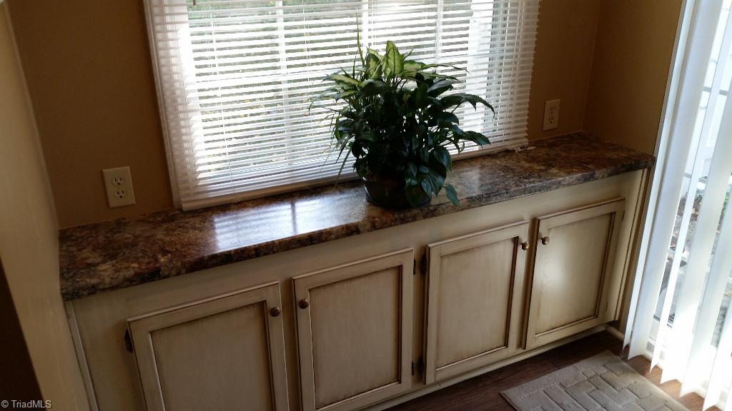 3216 Pipers Way High Point, NC 27265 - Photo 9 of 25 More cabinet space added in the breakfast area. Perfect serving area.