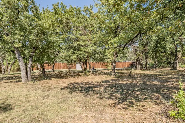 a fire hydrant in the middle of a field