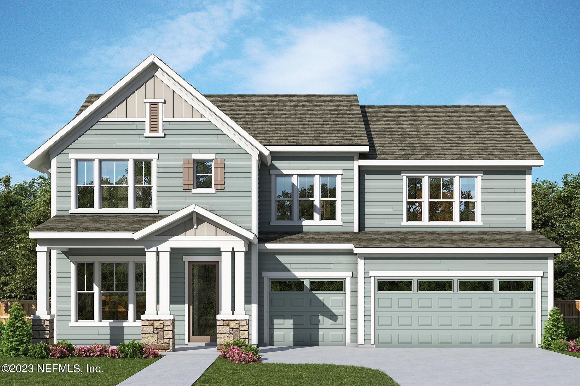 a view of a white house with large windows