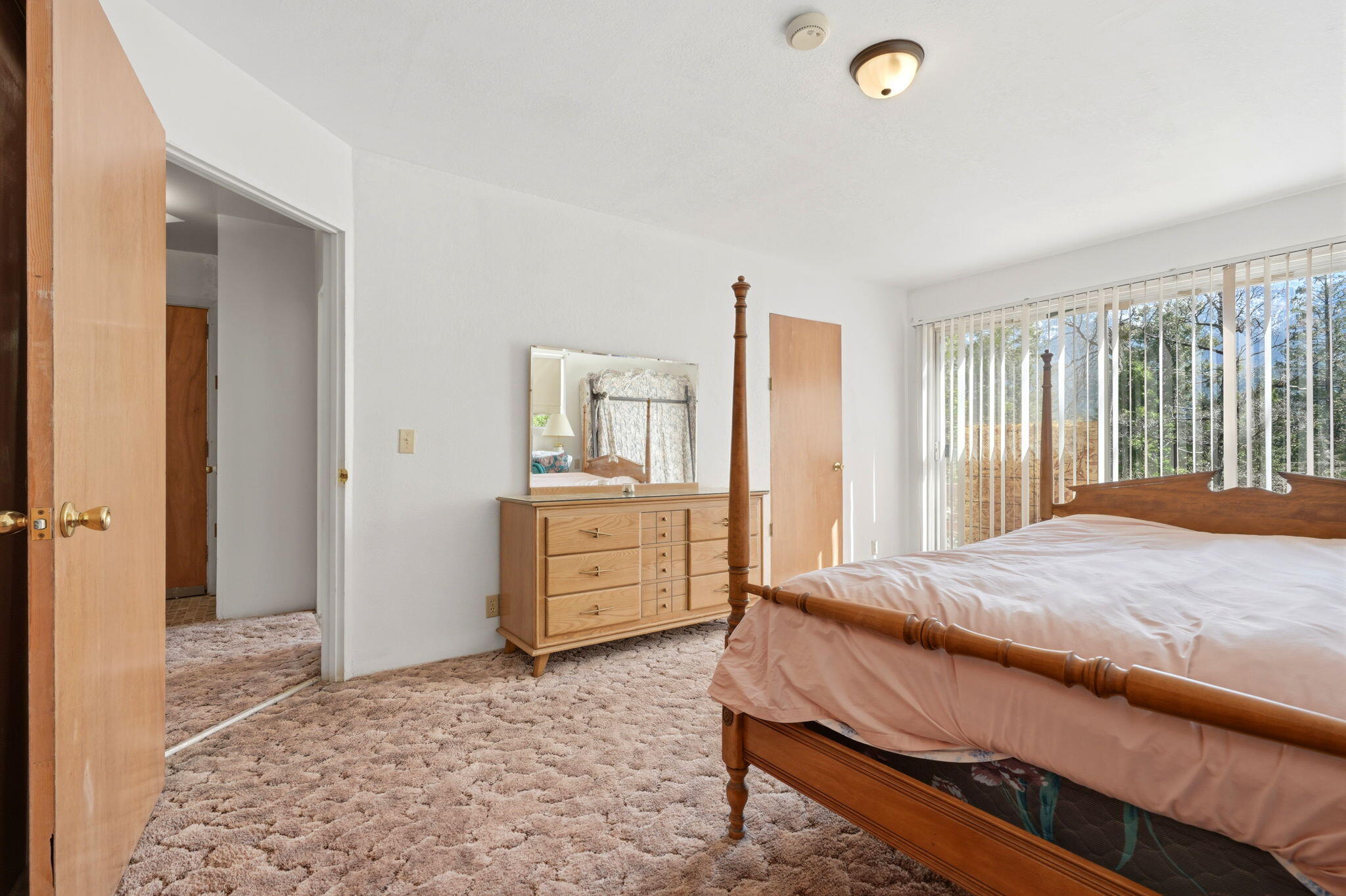 697 Loop Drive Springville, CA 93265 - Photo 27 of 55 a bedroom with a bed and a dresser