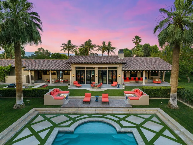 a bed room with a bed and a couch