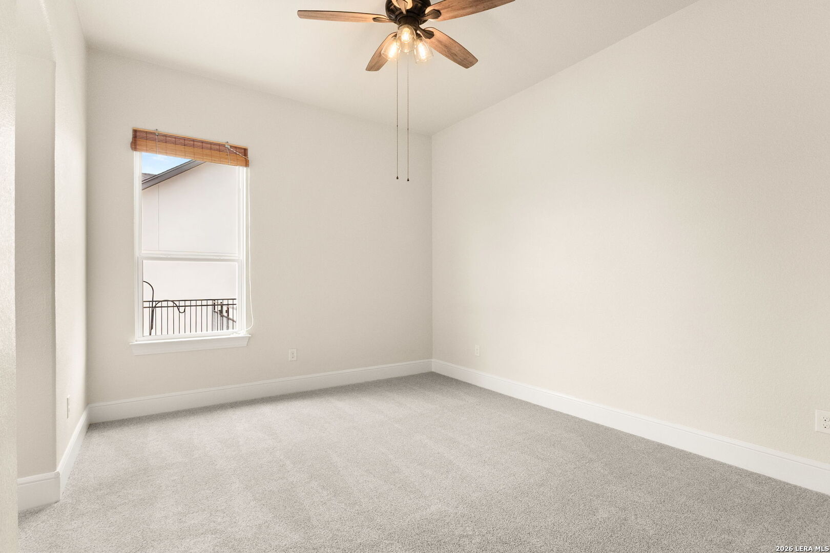 1217 Paladin Trail Spring Branch, TX 78070 - Photo 28 of 53 an empty room with a window and a fan