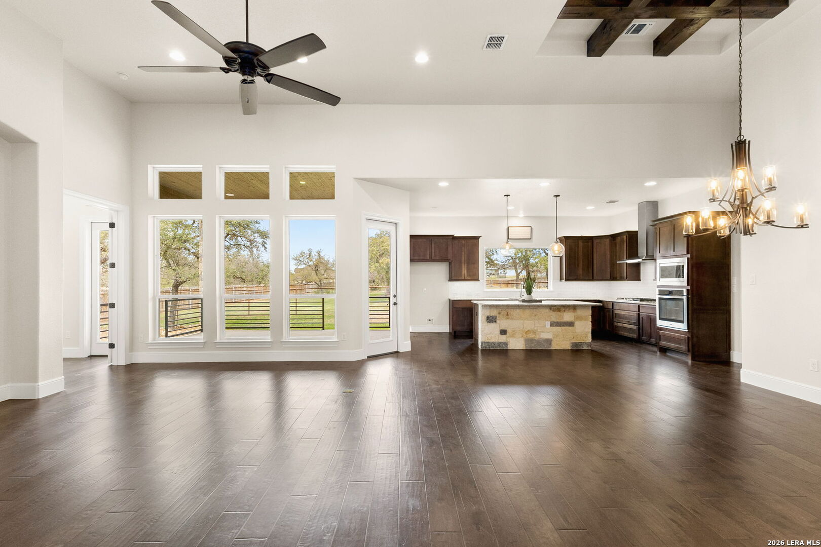 1217 Paladin Trail Spring Branch, TX 78070 - Photo 3 of 53 a view of kitchen with furniture and wooden floor