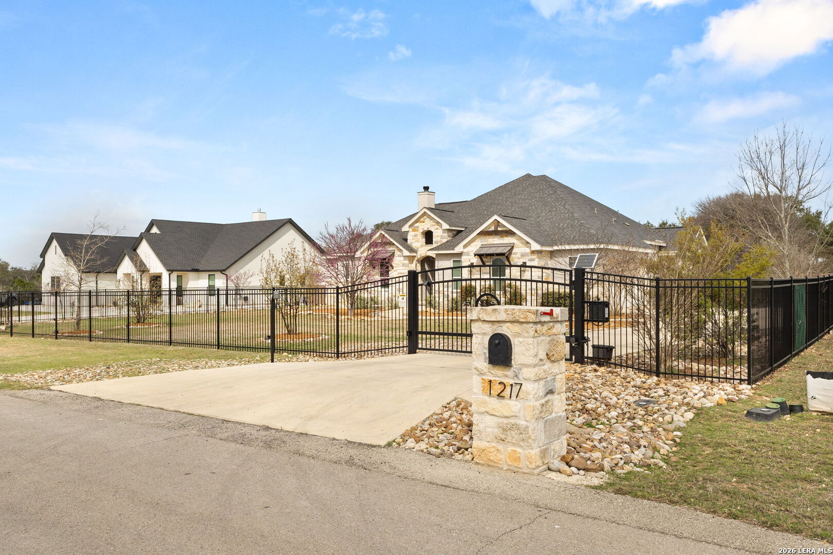1217 Paladin Trail Spring Branch, TX 78070 - Photo 34 of 53 a view of a town with large trees and fence