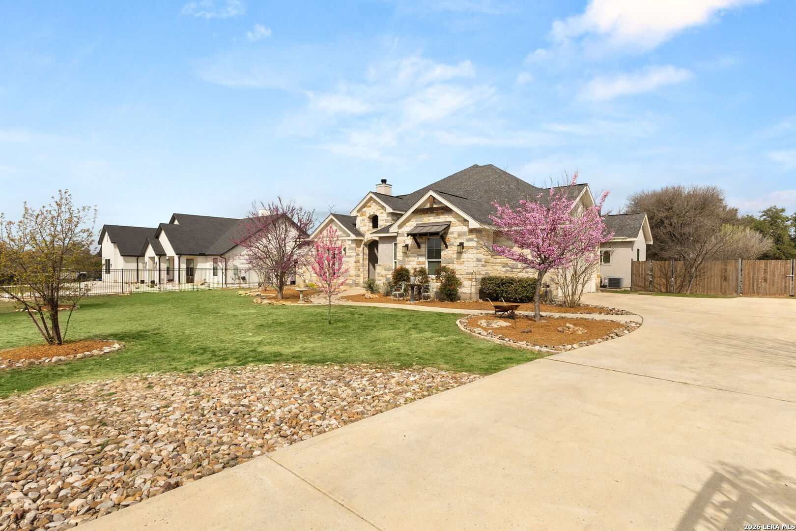1217 Paladin Trail Spring Branch, TX 78070 - Photo 35 of 53 a view of house with a yard and a car park
