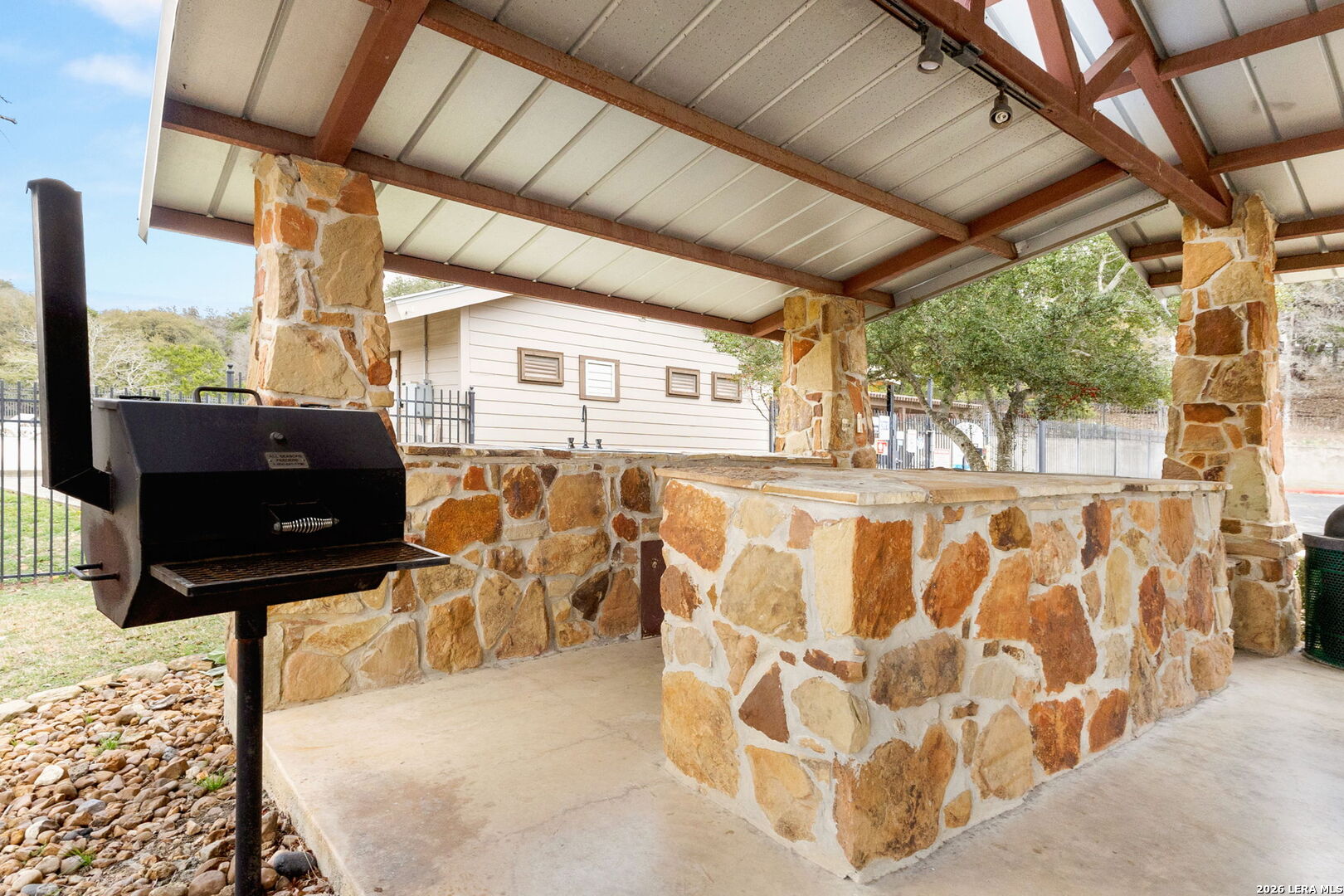 1217 Paladin Trail Spring Branch, TX 78070 - Photo 44 of 53 a front view of a building with seating space