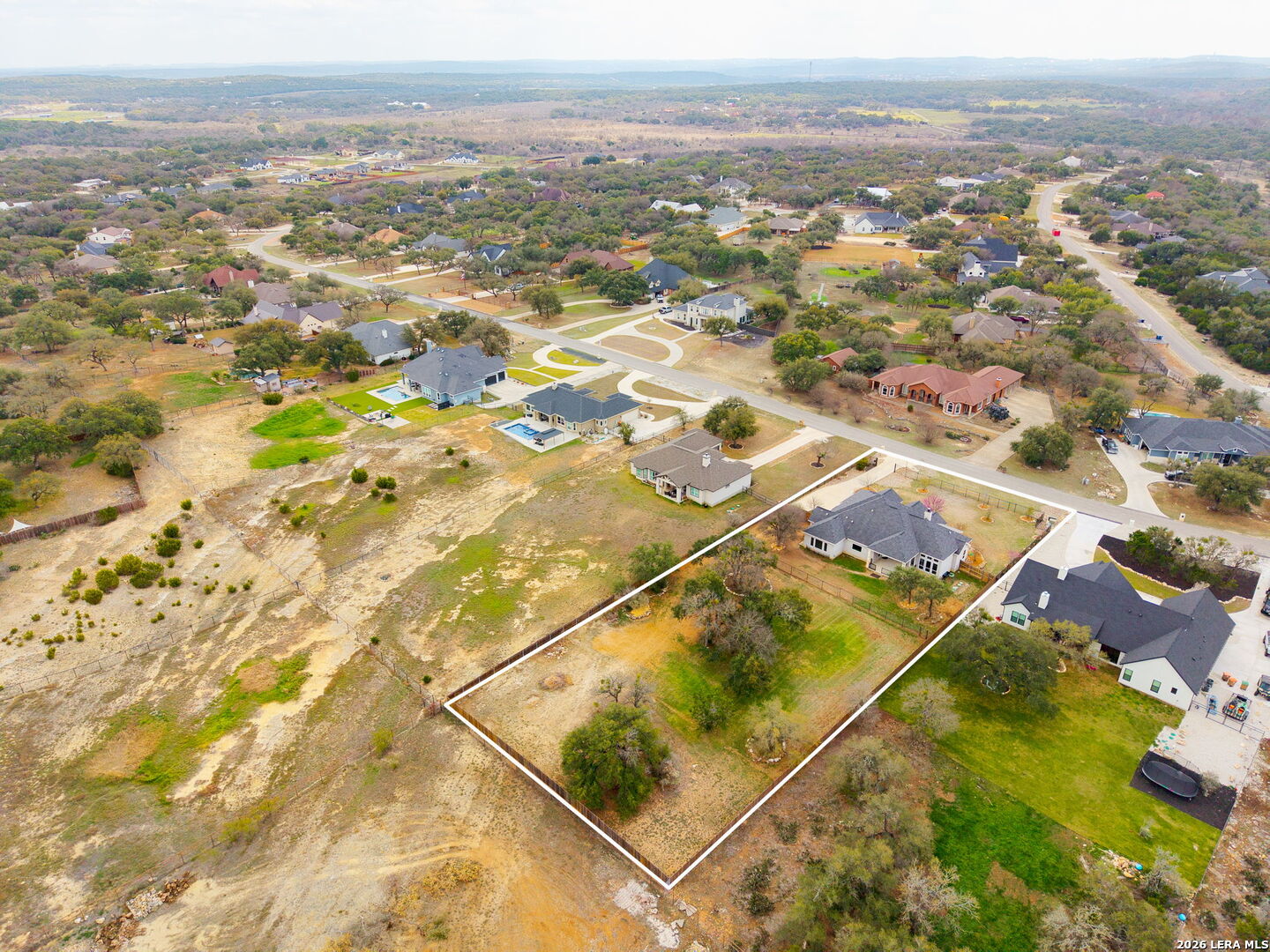 1217 Paladin Trail Spring Branch, TX 78070 - Photo 50 of 53 an aerial view of residential houses with outdoor space