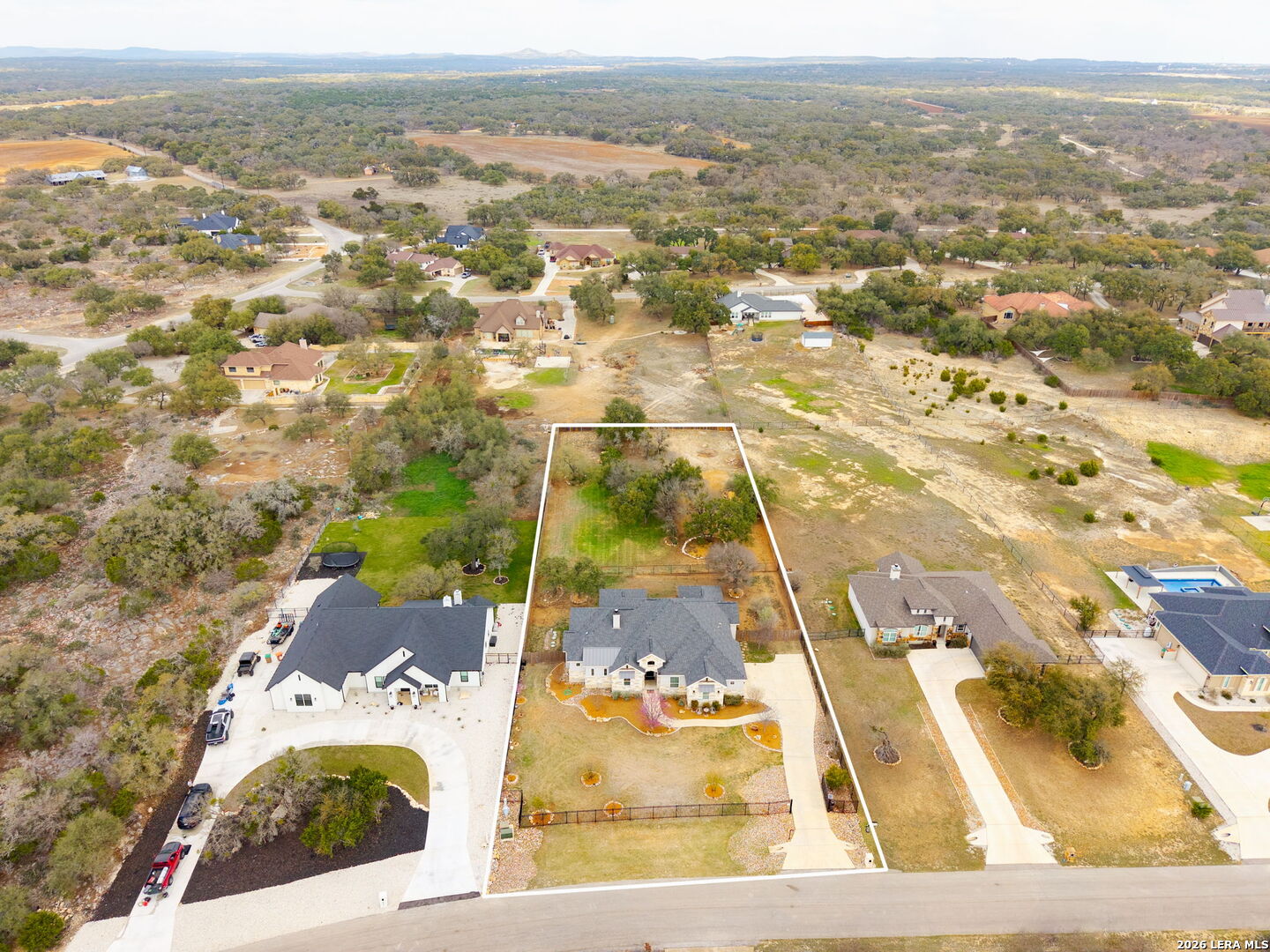 1217 Paladin Trail Spring Branch, TX 78070 - Photo 53 of 53 an aerial view of residential houses with outdoor space