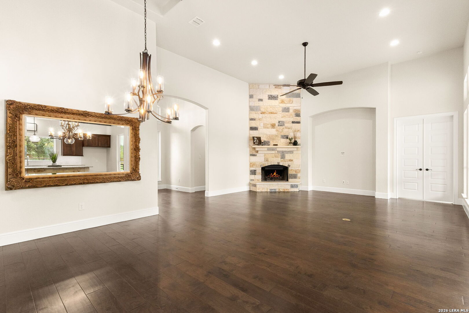 1217 Paladin Trail Spring Branch, TX 78070 - Photo 6 of 53 wooden floor in an empty room with a window
