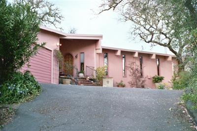 1000 Riverside Drive Ukiah, CA 95482 - Photo 2 of 12 a view of a house with a patio and a yard