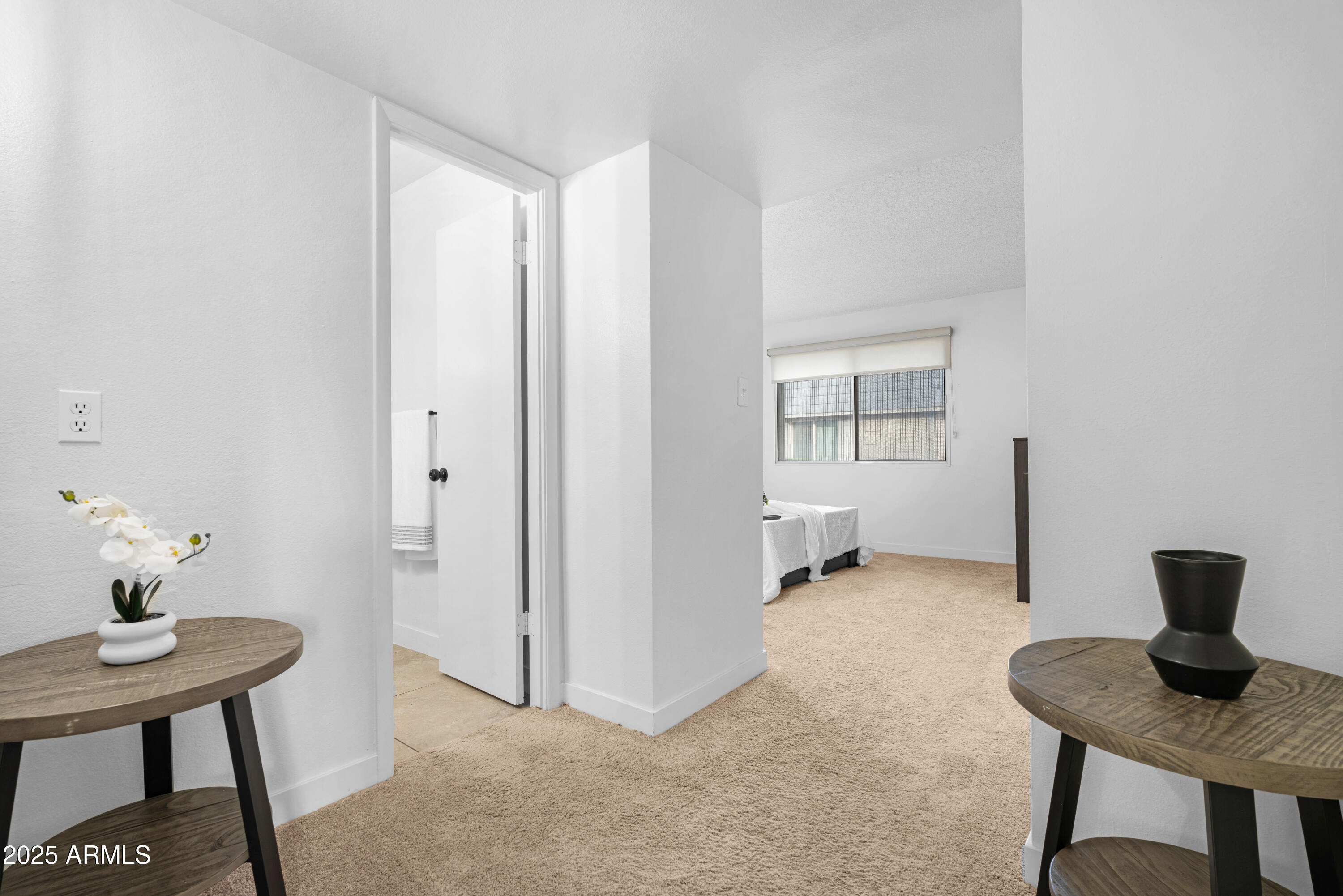 2042 West Elm Street Phoenix, AZ 85015 - Photo 24 of 35 a view of a workspace with furniture and a window