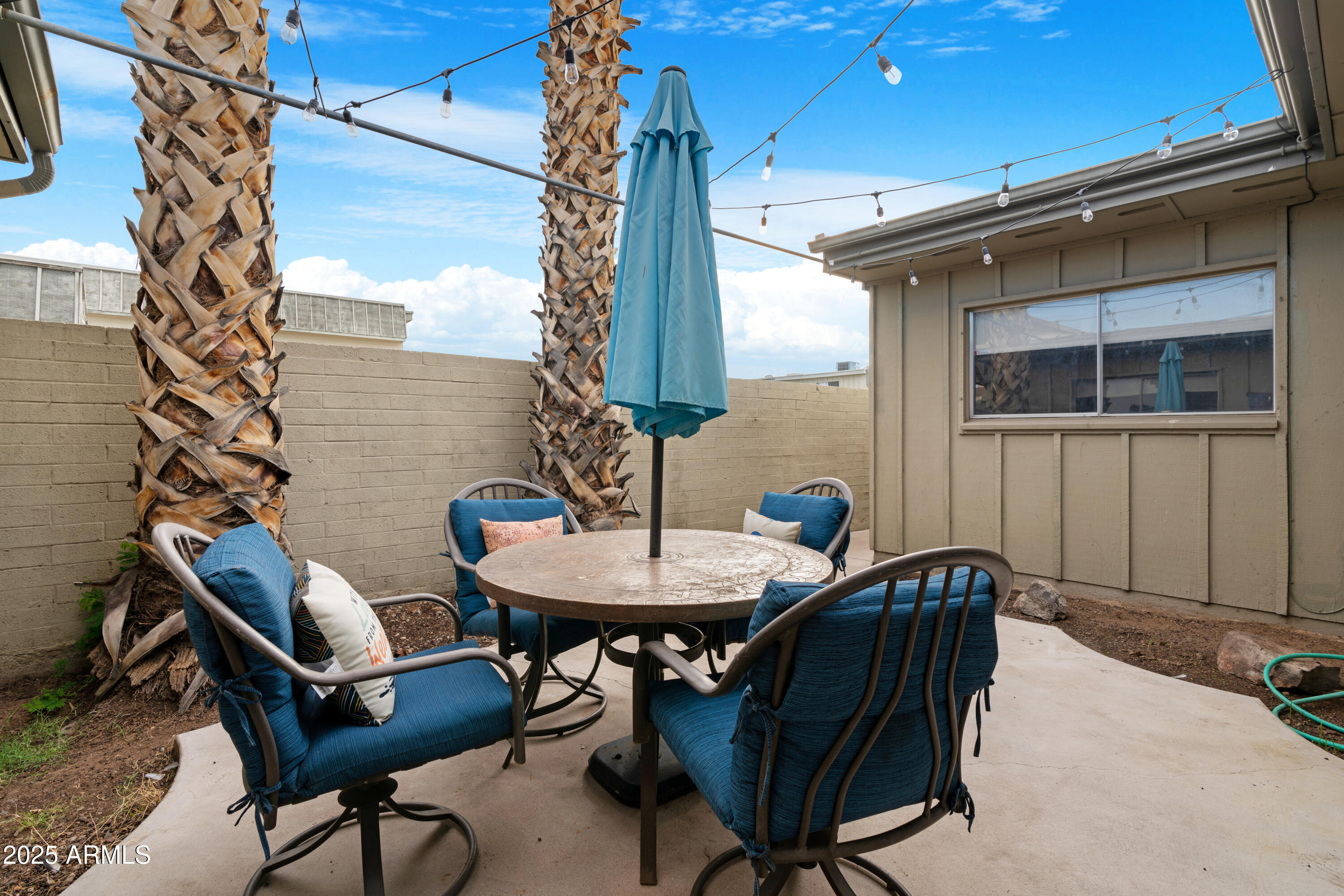 2042 West Elm Street Phoenix, AZ 85015 - Photo 32 of 35 a backyard of a house with table and chairs