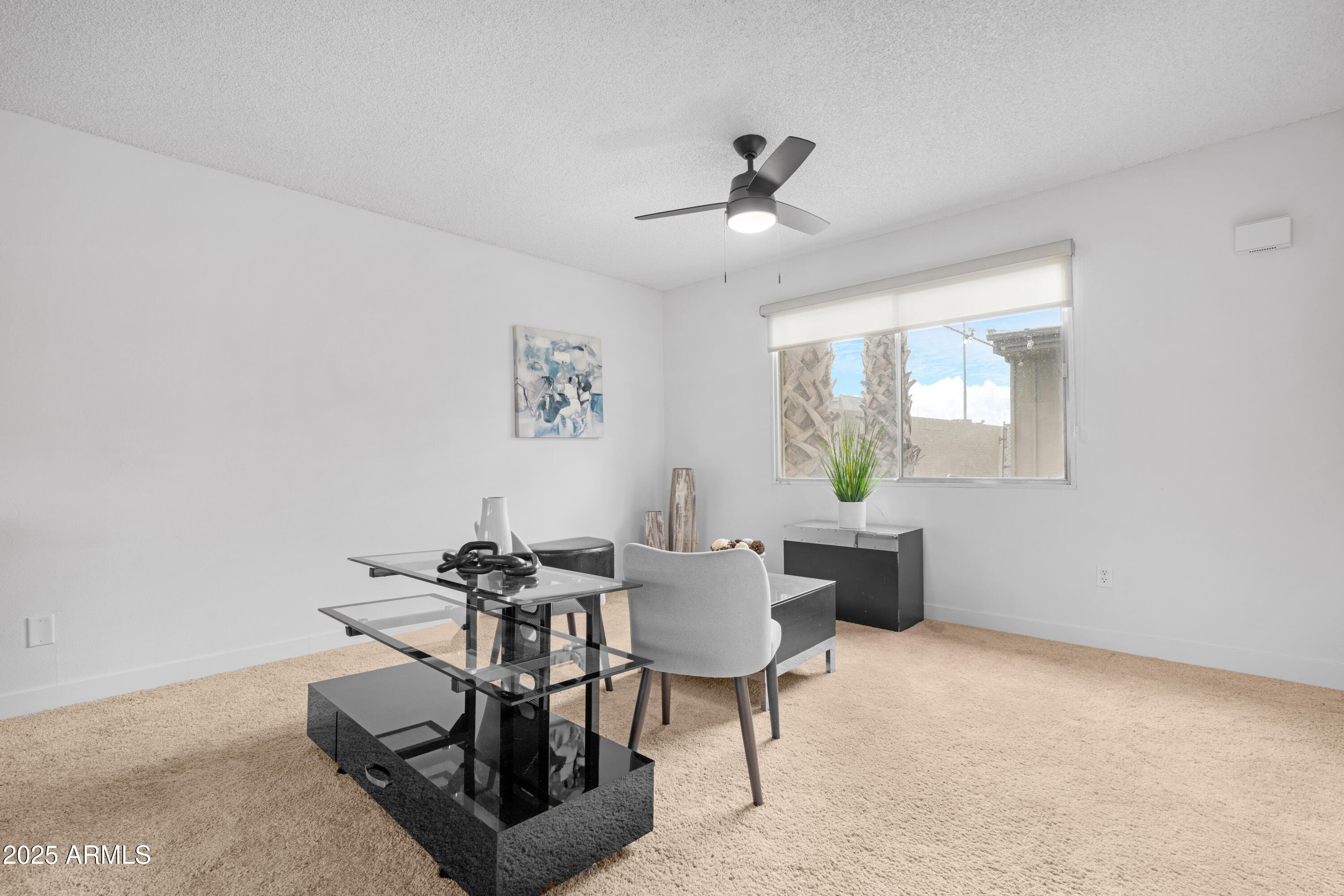 2042 West Elm Street Phoenix, AZ 85015 - Photo 7 of 35 a living room with furniture and a window