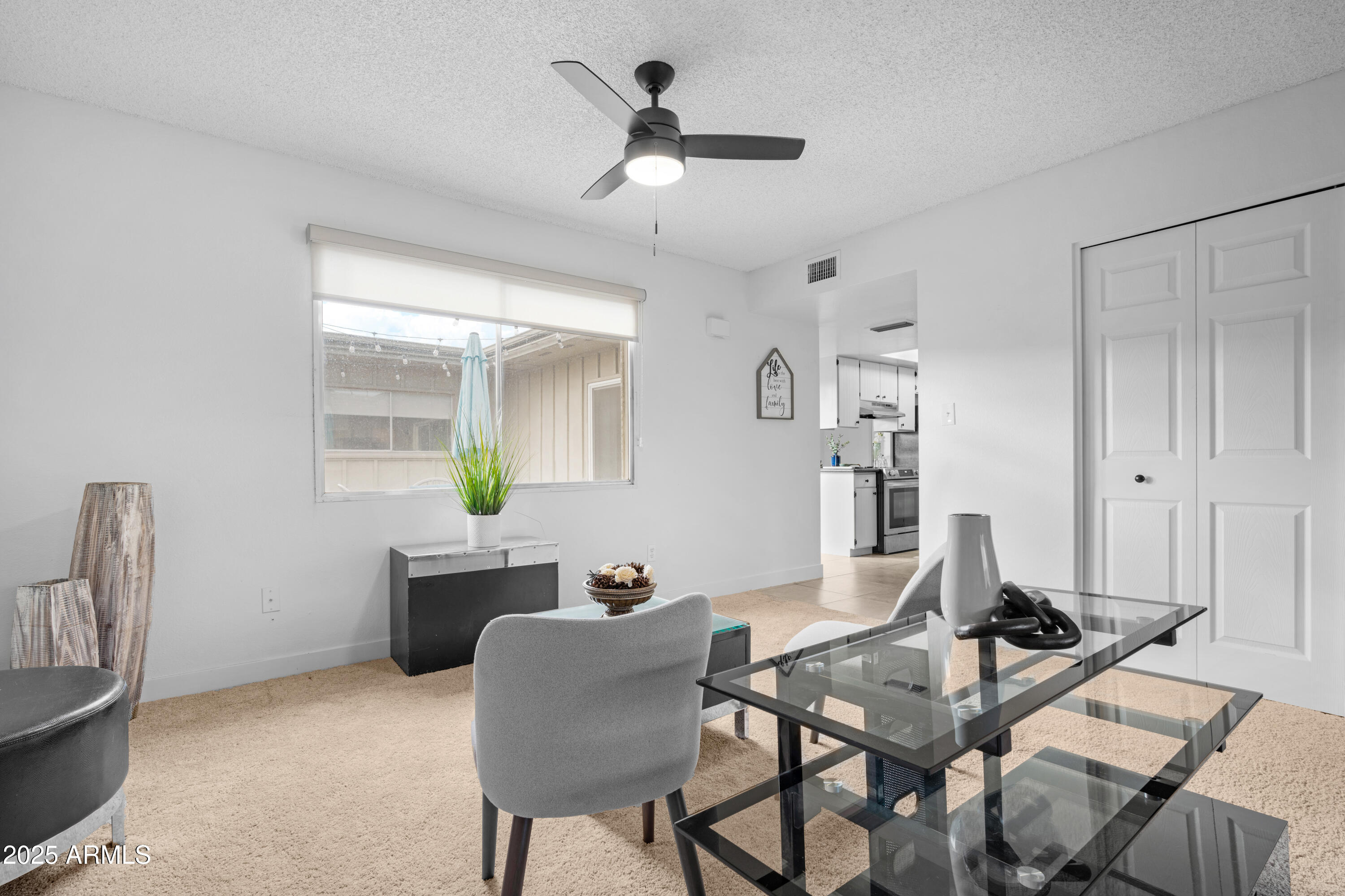 2042 West Elm Street Phoenix, AZ 85015 - Photo 8 of 35 a workspace with furniture and window