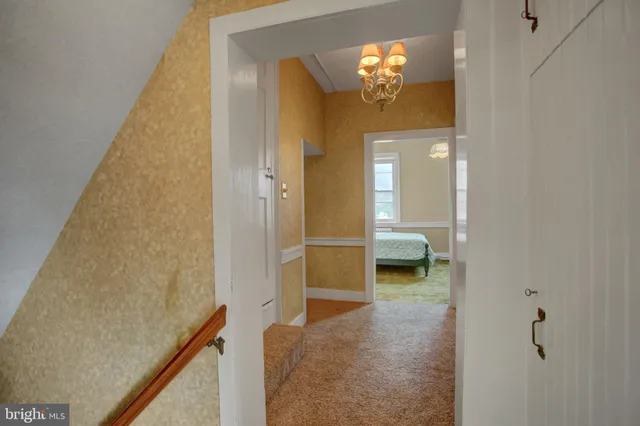 a bathroom with a sink and a window