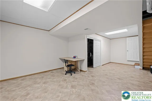 a view of a room with a table and chair