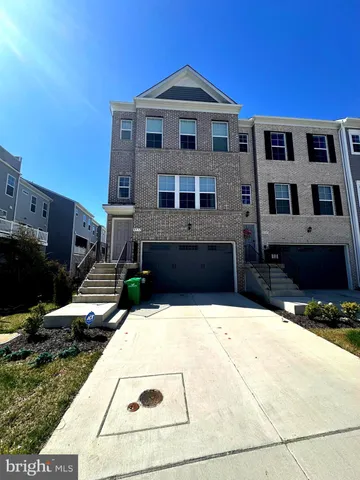 a front view of a house with yard