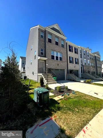a front view of a house with swimming pool