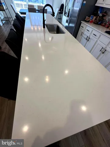 a hallway with wooden floor