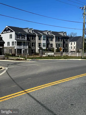 a view of a building with a street