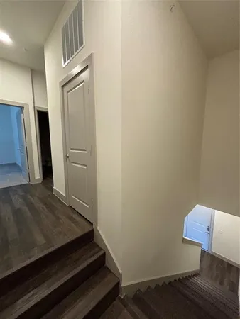 a view of small space with wooden floor