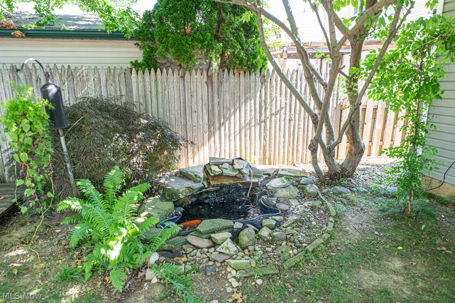 916 Center Road Eastlake, OH 44095 - Photo 35 of 39 Soothing koi pond with waterfall
