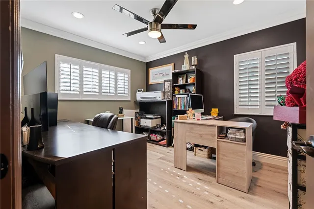 a kitchen with sink cabinets and window