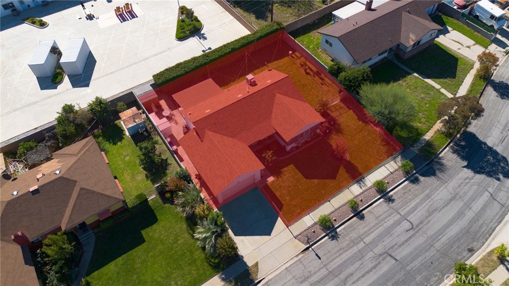 255 West Valencia Street Rialto, CA 92376 - Photo 27 of 34 an aerial view of houses with yard