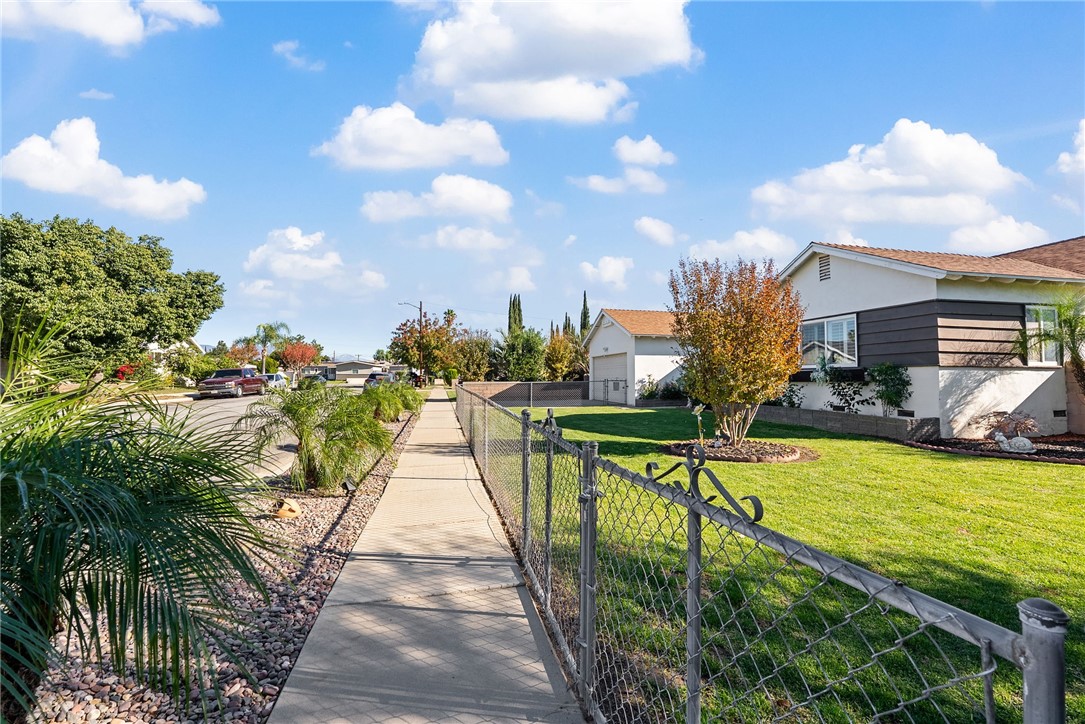 255 West Valencia Street Rialto, CA 92376 - Photo 30 of 34 a view of a swimming pool with a patio
