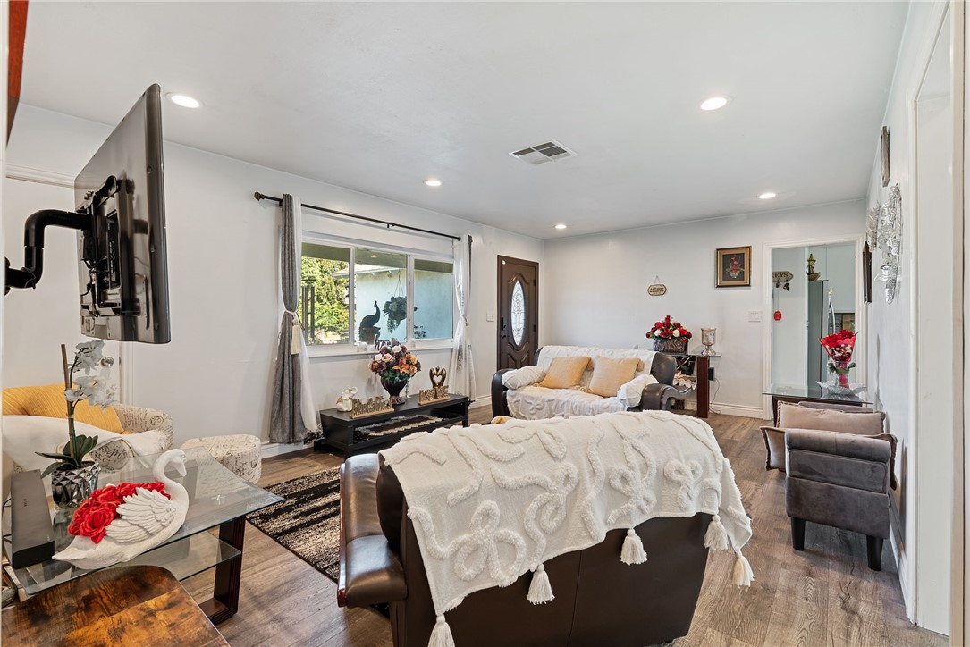 255 West Valencia Street Rialto, CA 92376 - Photo 7 of 34 a bed room with two bed and a couch