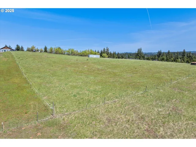 a view of an ocean and a mountain