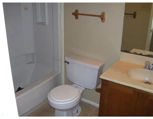 a view of swimming pool with a yard