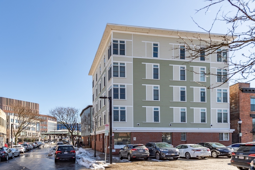 10 Roxbury Street Boston, MA 02119 - Photo 2 of 20 a front view of a building with cars parked
