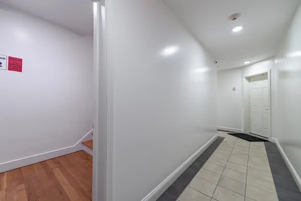 a view of hallway with a window