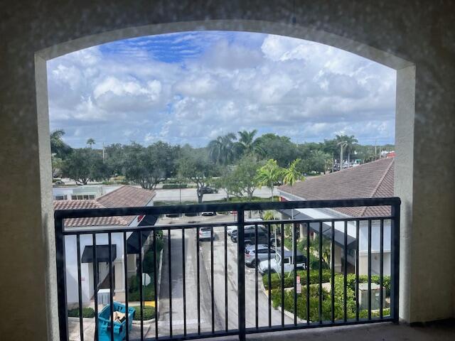 3 Renaissance Way, Unit 411 Boynton Beach, FL 33426 - Photo 8 of 9 a balcony with street view