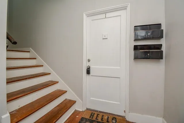 a view of an entryway with hallway
