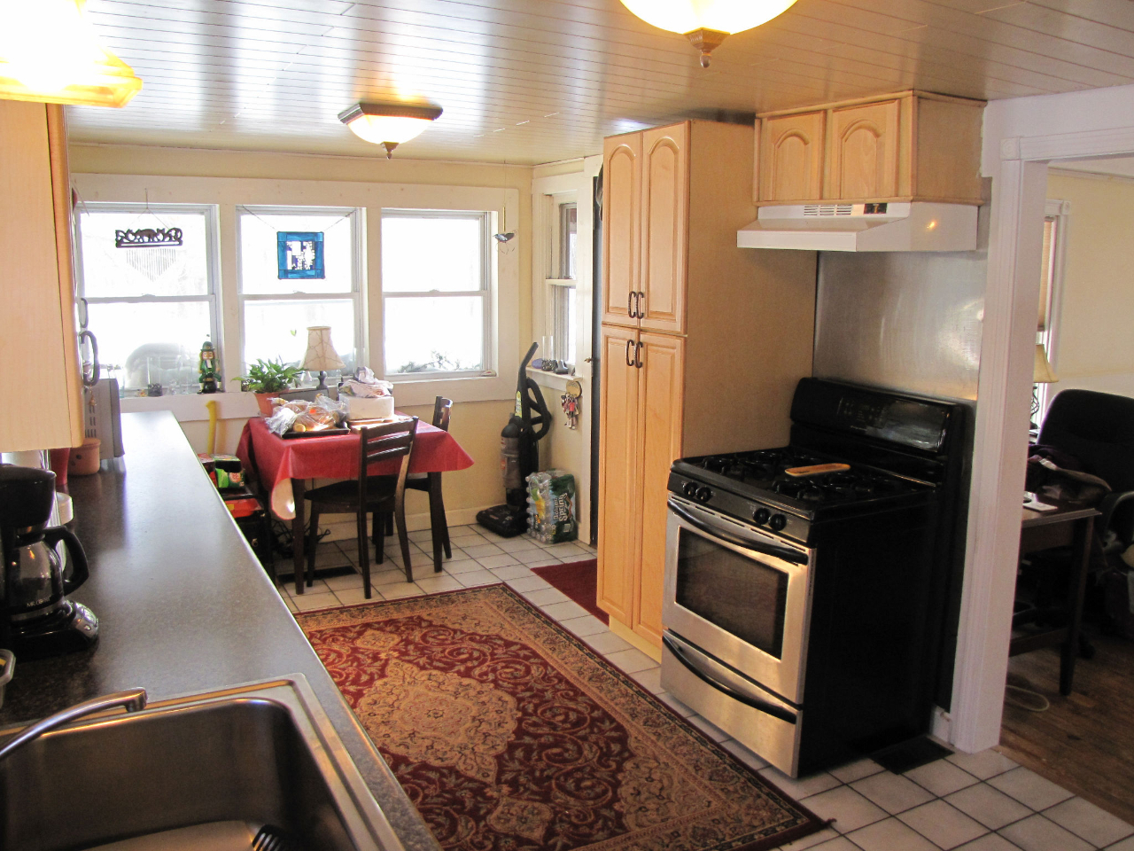 826 Shaw Road Windsor, MA 01270 - Photo 14 of 32 a kitchen with stainless steel appliances granite countertop a refrigerator stove and sink