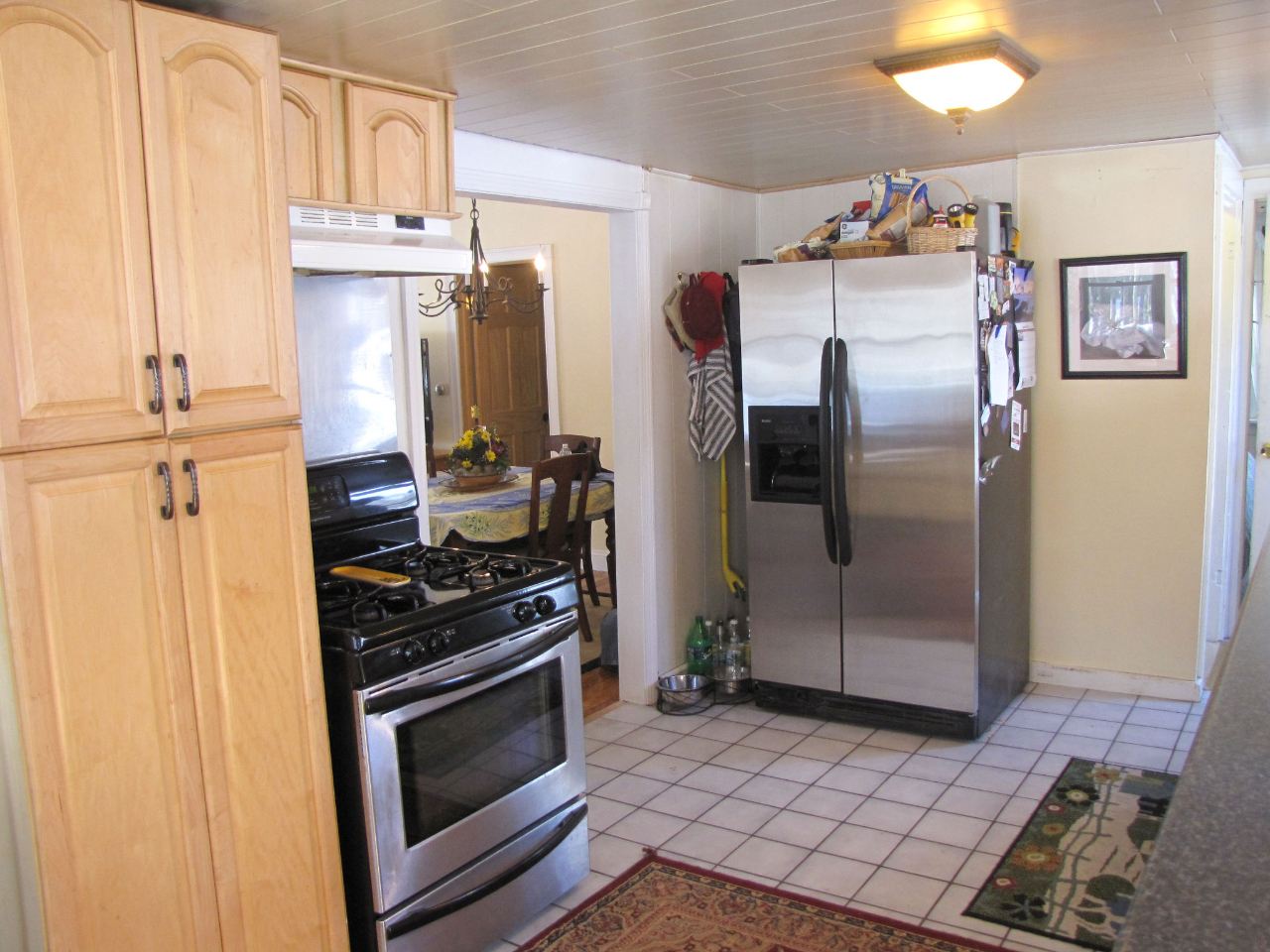 826 Shaw Road Windsor, MA 01270 - Photo 16 of 32 a kitchen with stainless steel appliances a stove a refrigerator and cabinets