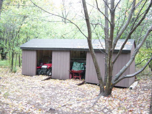 826 Shaw Road Windsor, MA 01270 - Photo 20 of 32 a view of a house with a yard and large tree