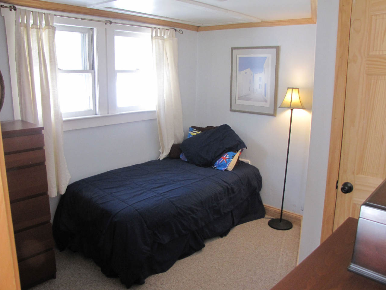 826 Shaw Road Windsor, MA 01270 - Photo 7 of 32 a bedroom with a bed and wooden floor