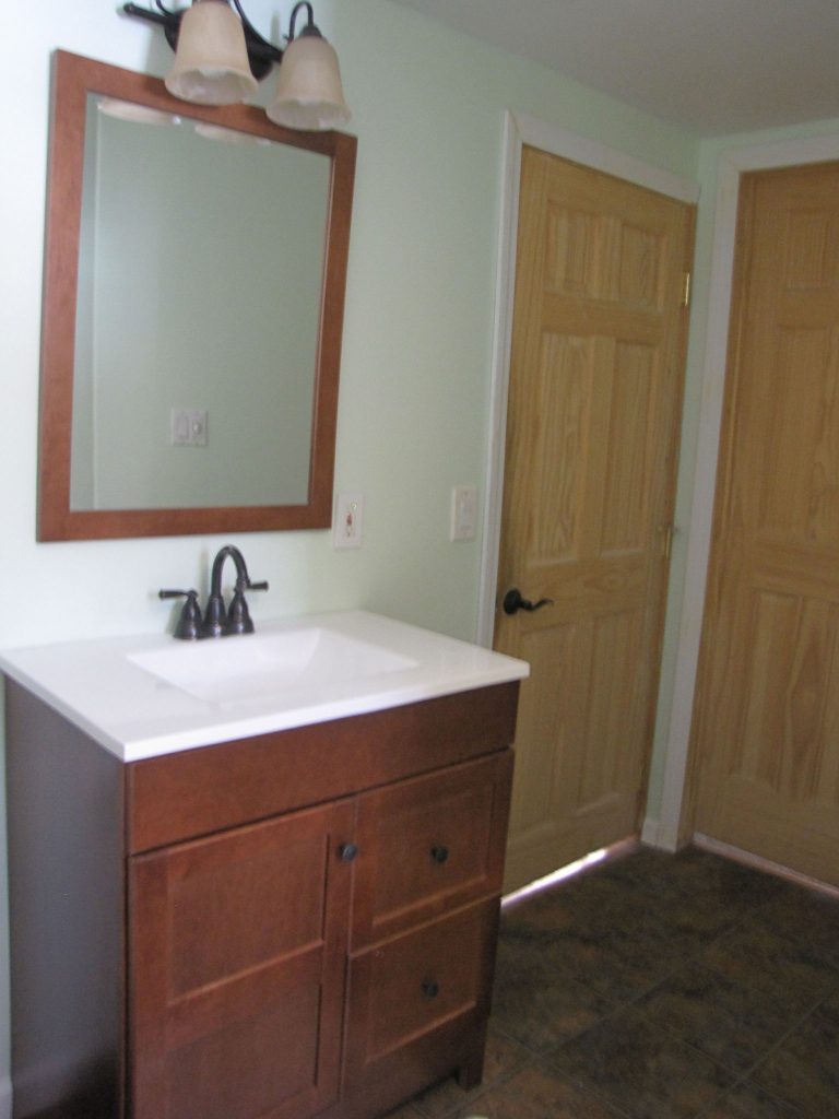 826 Shaw Road Windsor, MA 01270 - Photo 10 of 32 a bathroom with a sink vanity and a mirror