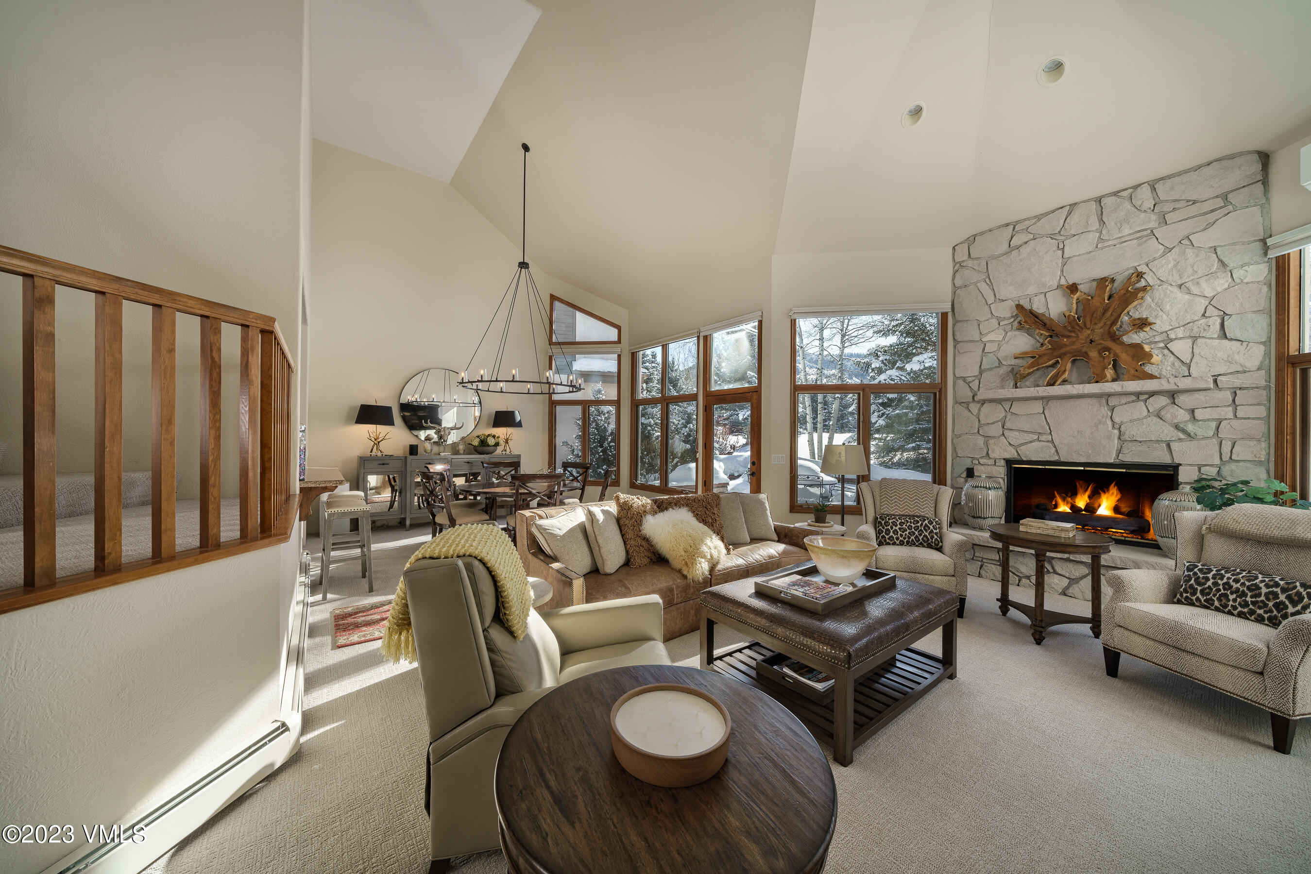 176 Windermere Circle Edwards, CO 81632 - Photo 12 of 42 a living room with furniture fireplace and a large window