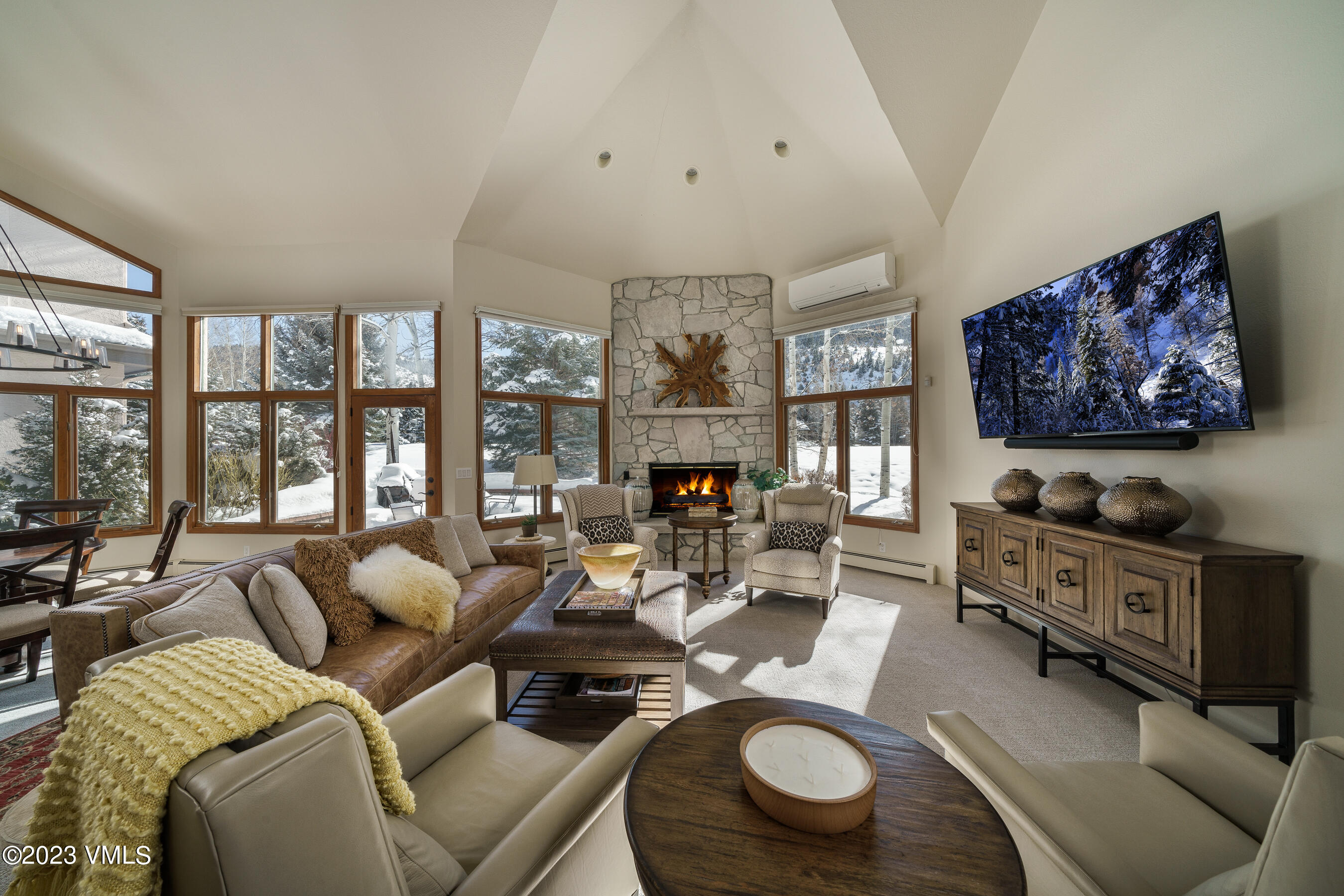 176 Windermere Circle Edwards, CO 81632 - Photo 15 of 42 a living room with furniture couches and a flat screen tv