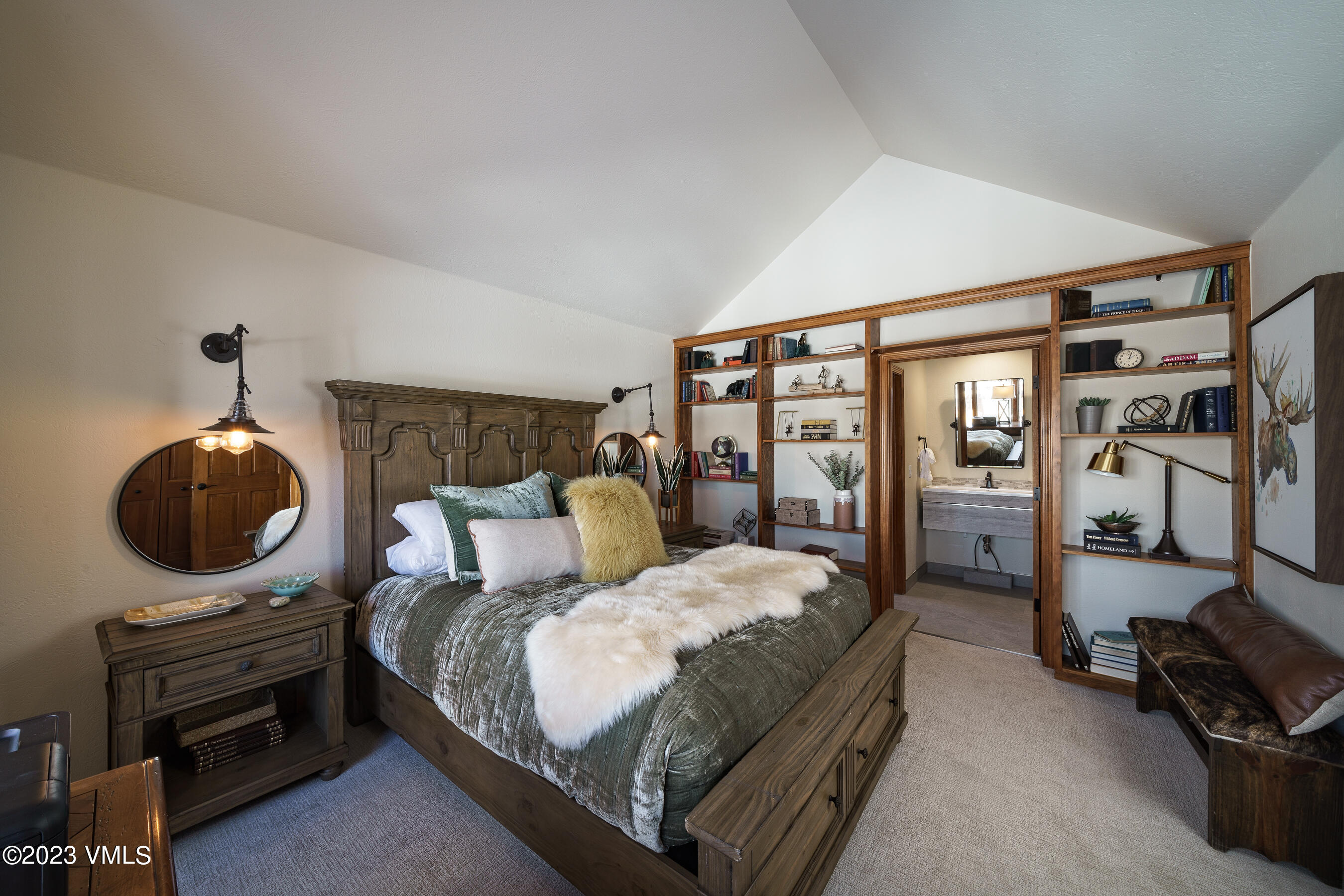 176 Windermere Circle Edwards, CO 81632 - Photo 23 of 42 a bedroom with a large bed a flat tv screen and dresser